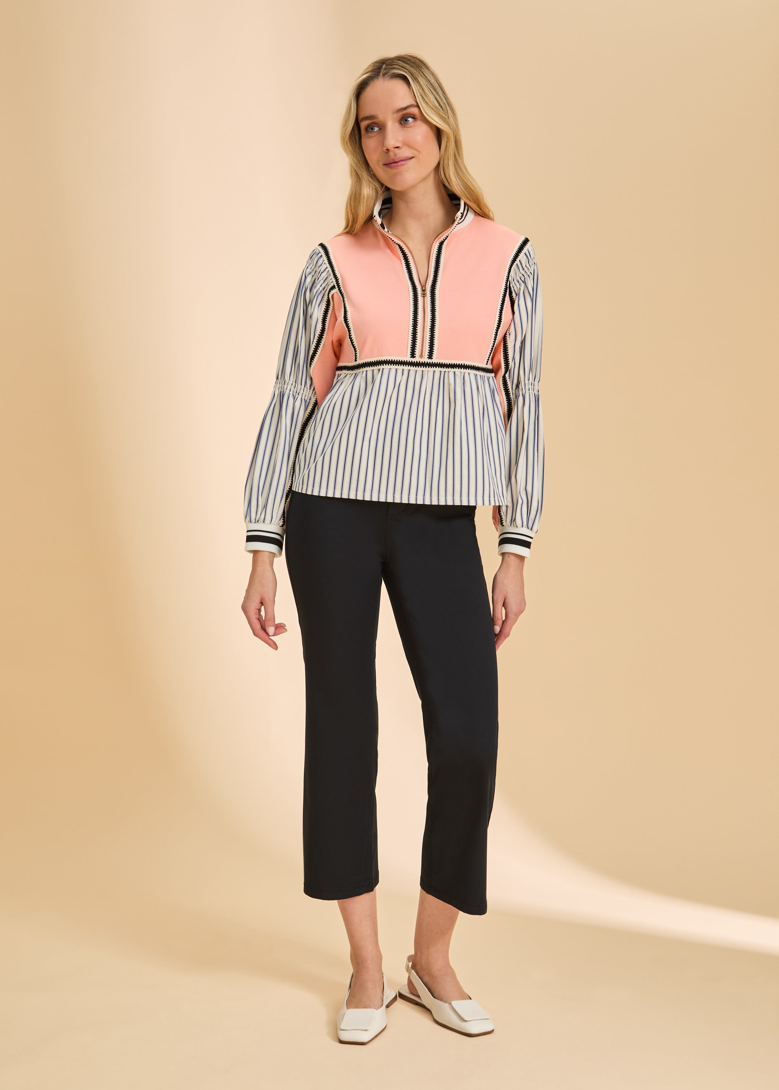 Front view of black crop pants with high-rise waist and fitted design by French Dressing Jeans (FDJ)