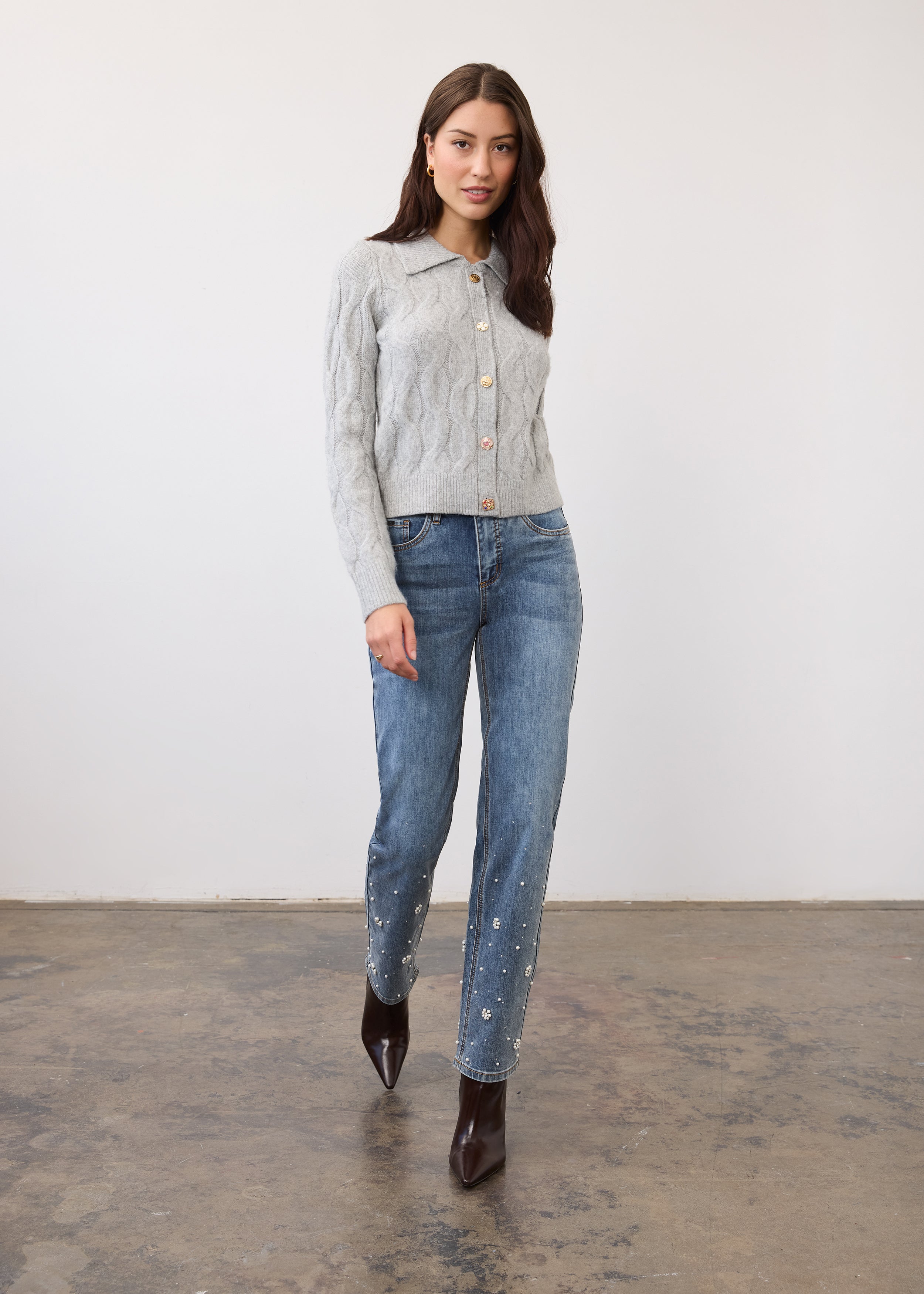 Full view of indigo jeans with pearl embellishments and mid-rise fit by French Dressing Jeans (FDJ)