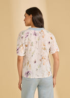 Back view of 3/4 sleeve embellished top in Delicate highlighting floral pattern and soft knit fabric by French Dressing Jeans (FDJ)