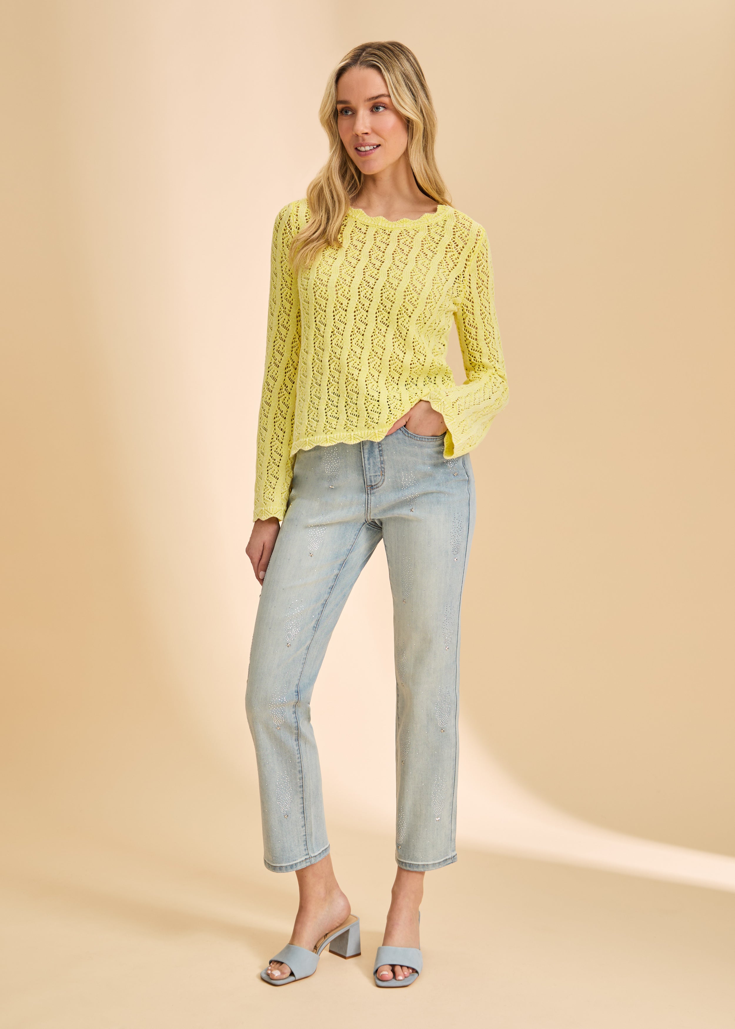 Front view of light wash jeans with subtle embellishments by French Dressing Jeans (FDJ)