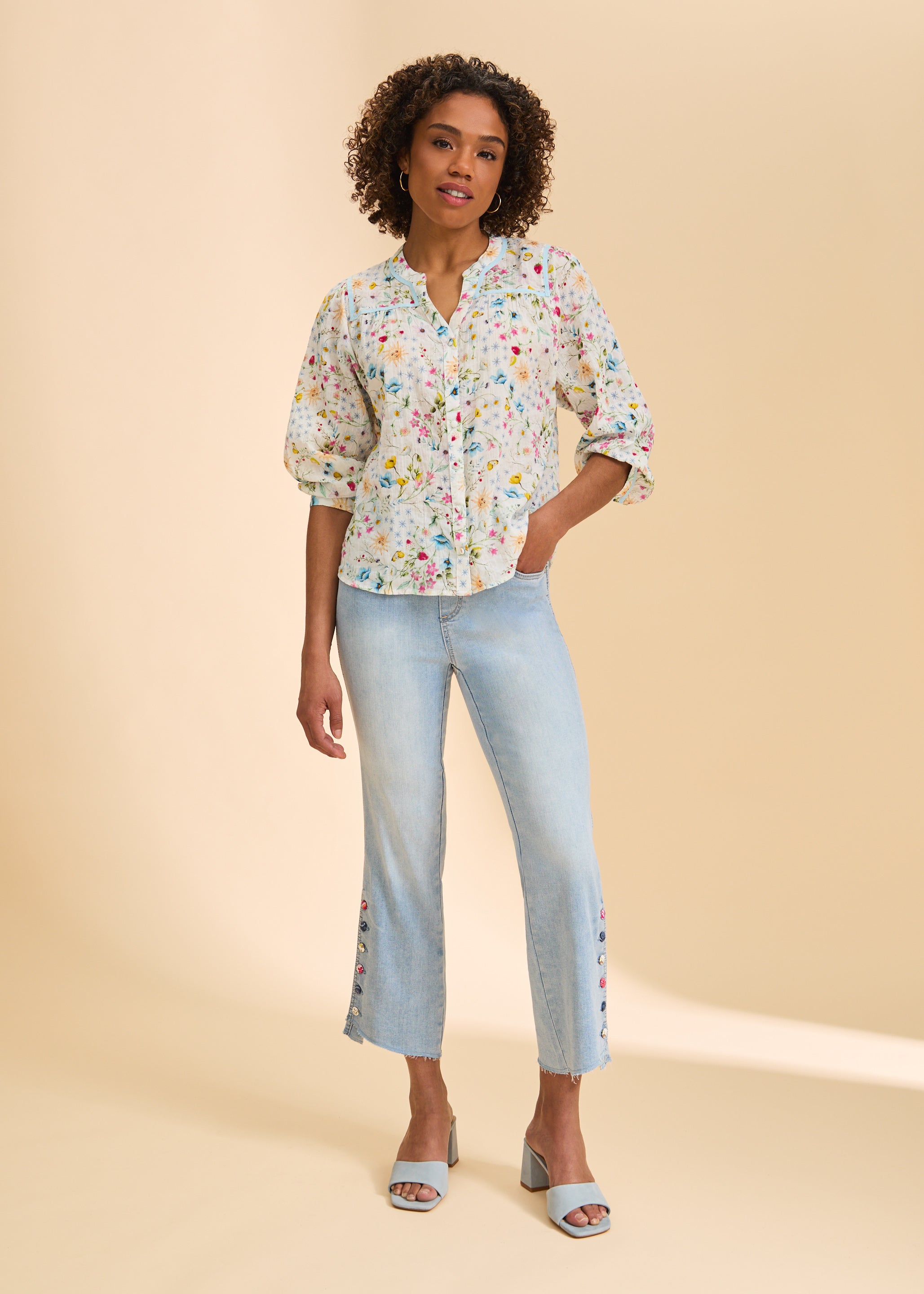 Full view of floral print blouse paired with light jeans by French Dressing Jeans (FDJ)