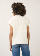 Back view of white ribbed top with high collar and seamless finish by French Dressing Jeans (FDJ)