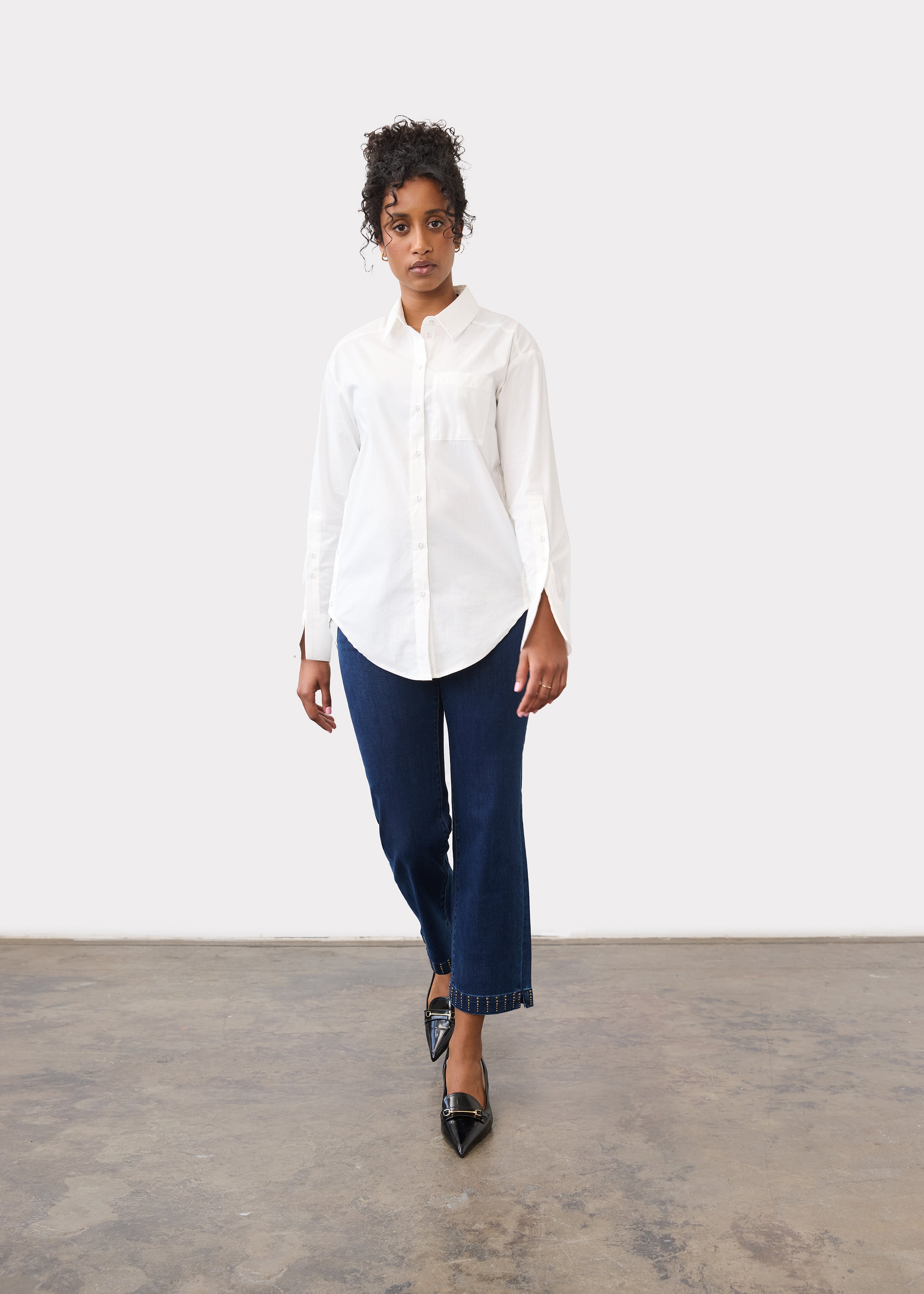 Full view of white shirt styled with denim in a casual setting by French Dressing Jeans (FDJ)