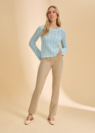 Full view of Pacific Blue sweater paired with beige pants by French Dressing Jeans (FDJ)