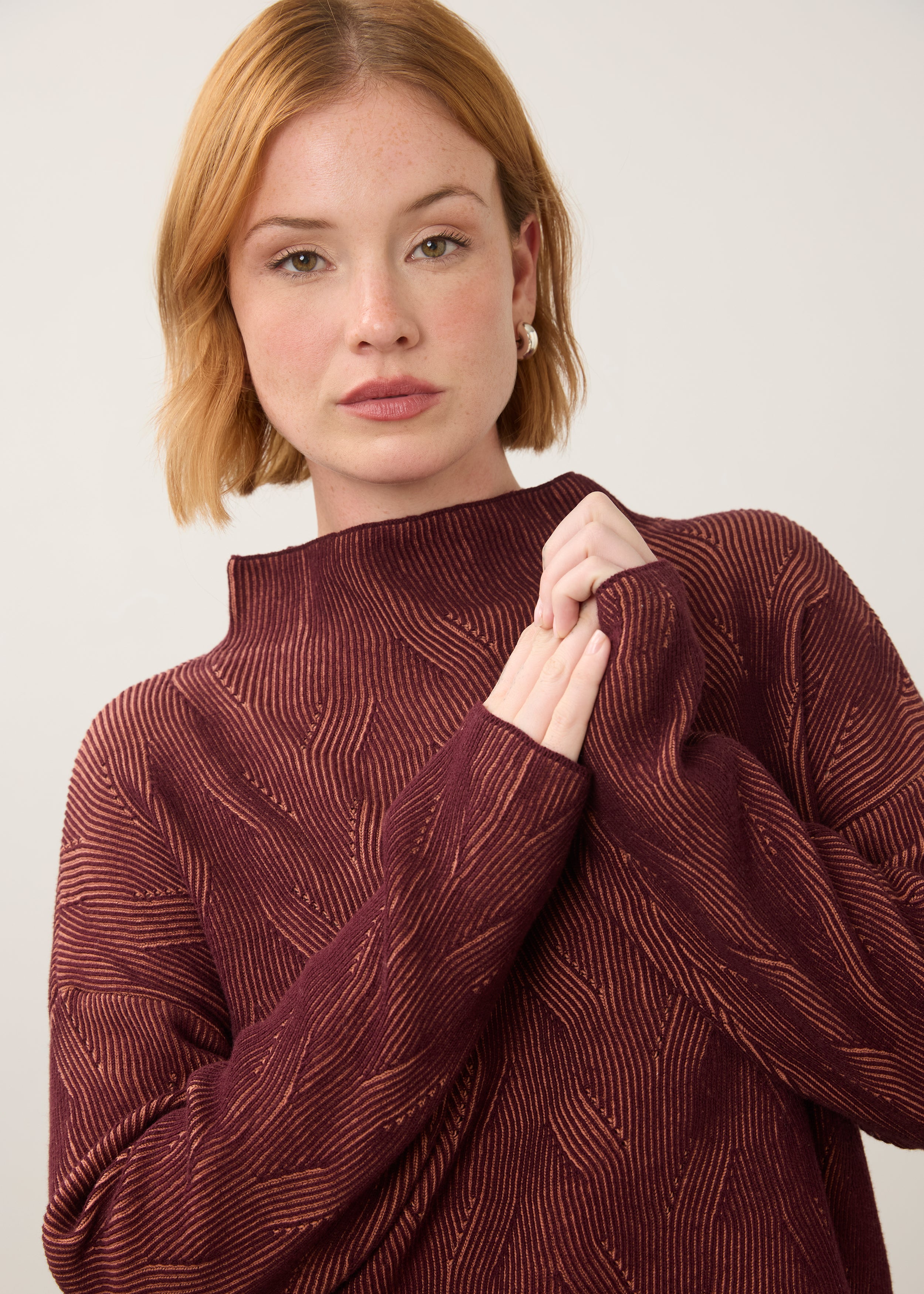 Close-up of burgundy patterned top with high collar detail by French Dressing Jeans (FDJ)