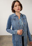 Close-up front view of denim jacket in medium wash highlighting button details by French Dressing Jeans (FDJ) par French Dressing Jeans (FDJ)