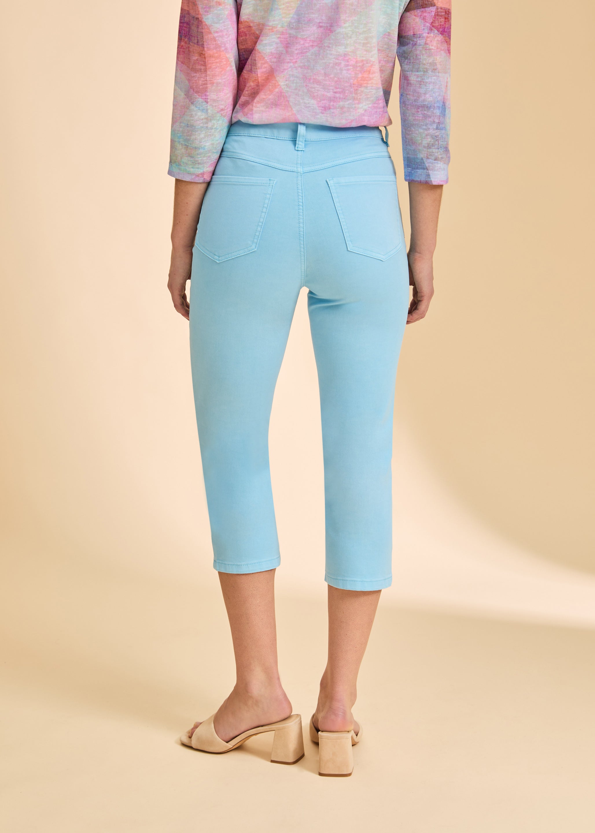 Back view of light blue cropped jeans, featuring classic pocket design by French Dressing Jeans (FDJ)