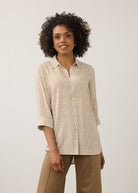 Front view of striped beige and white shirt with button front by French Dressing Jeans (FDJ)