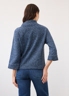 Back view of textured indigo top showing seamless design and relaxed fit by French Dressing Jeans (FDJ)
