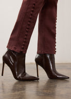 Detail of fig denim's side buttons on pencil leg and ankle length by French Dressing Jeans (FDJ)