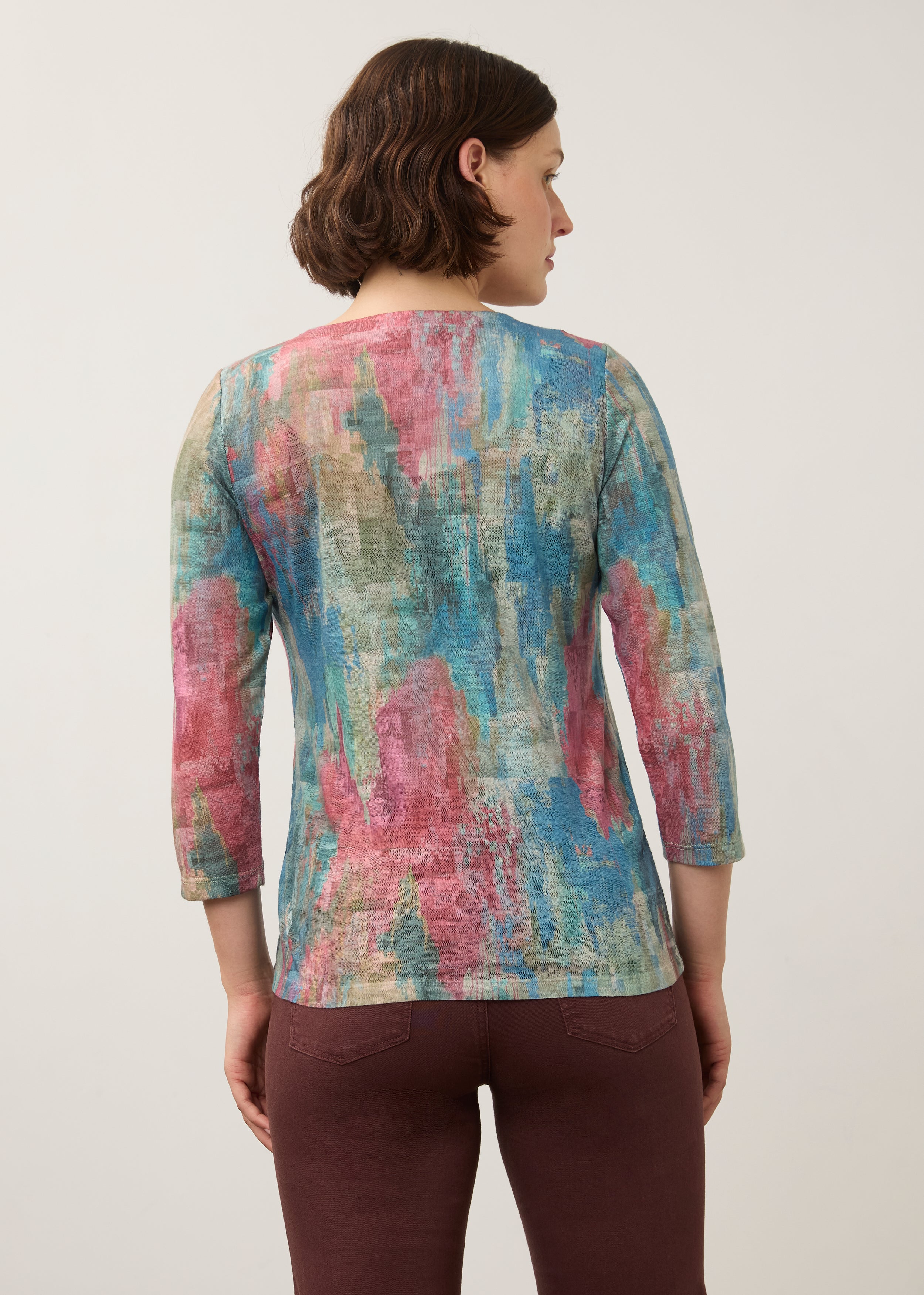 Back view of pastel Henley top with colorful abstract pattern and 3/4 sleeves by French Dressing Jeans (FDJ)