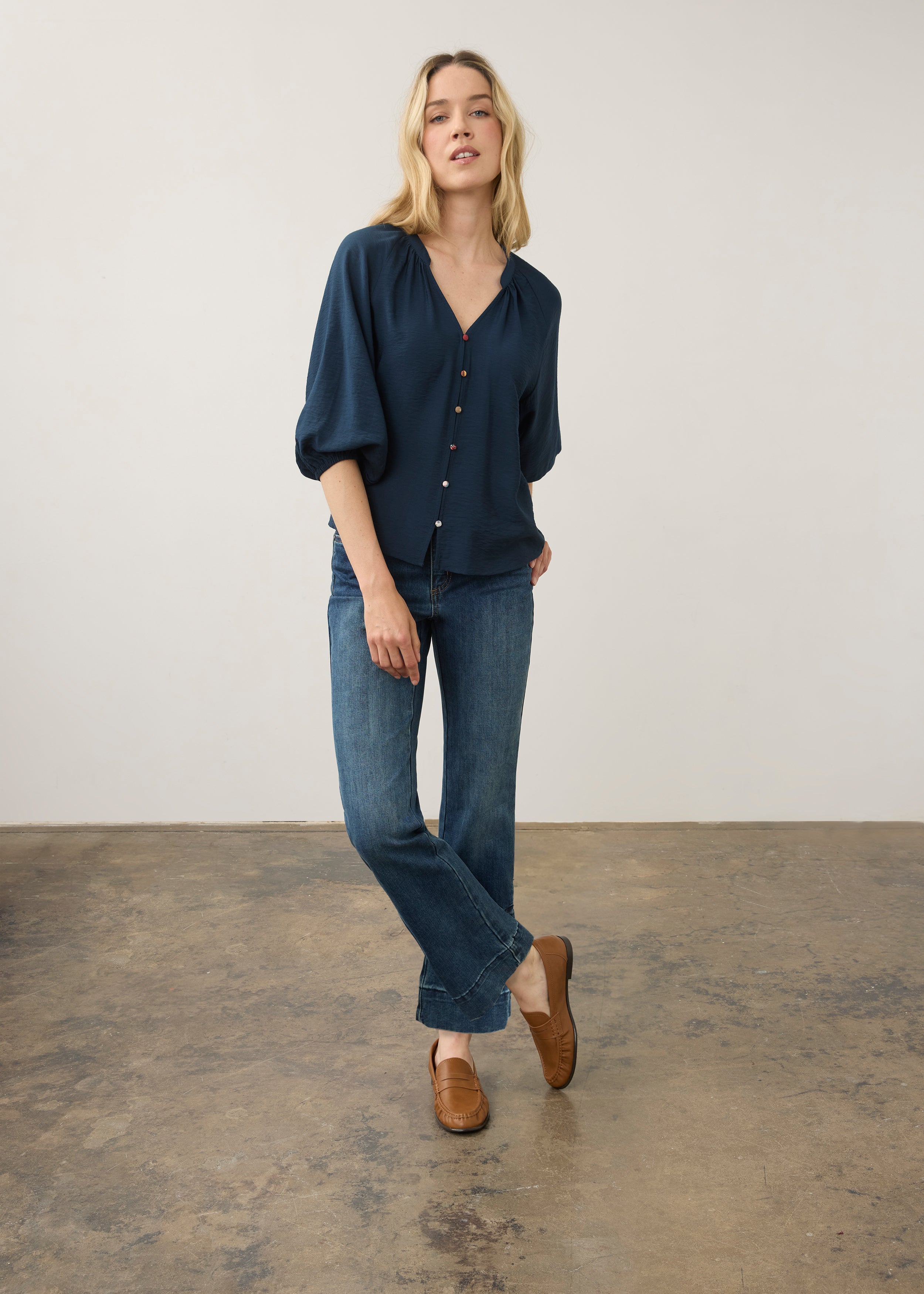 Full body view of medium blue Olivia denim emphasizing sleek design and patch pockets by French Dressing Jeans (FDJ)
