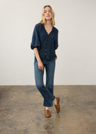 Full body view of medium blue Olivia denim emphasizing sleek design and patch pockets by French Dressing Jeans (FDJ)