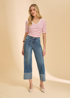 Full outfit with red striped V-neck top and wide-leg denim for a trendy style by French Dressing Jeans (FDJ)