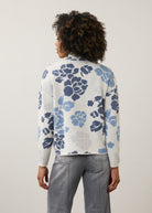 Back view of blue floral sweater showing seamless design by French Dressing Jeans (FDJ)