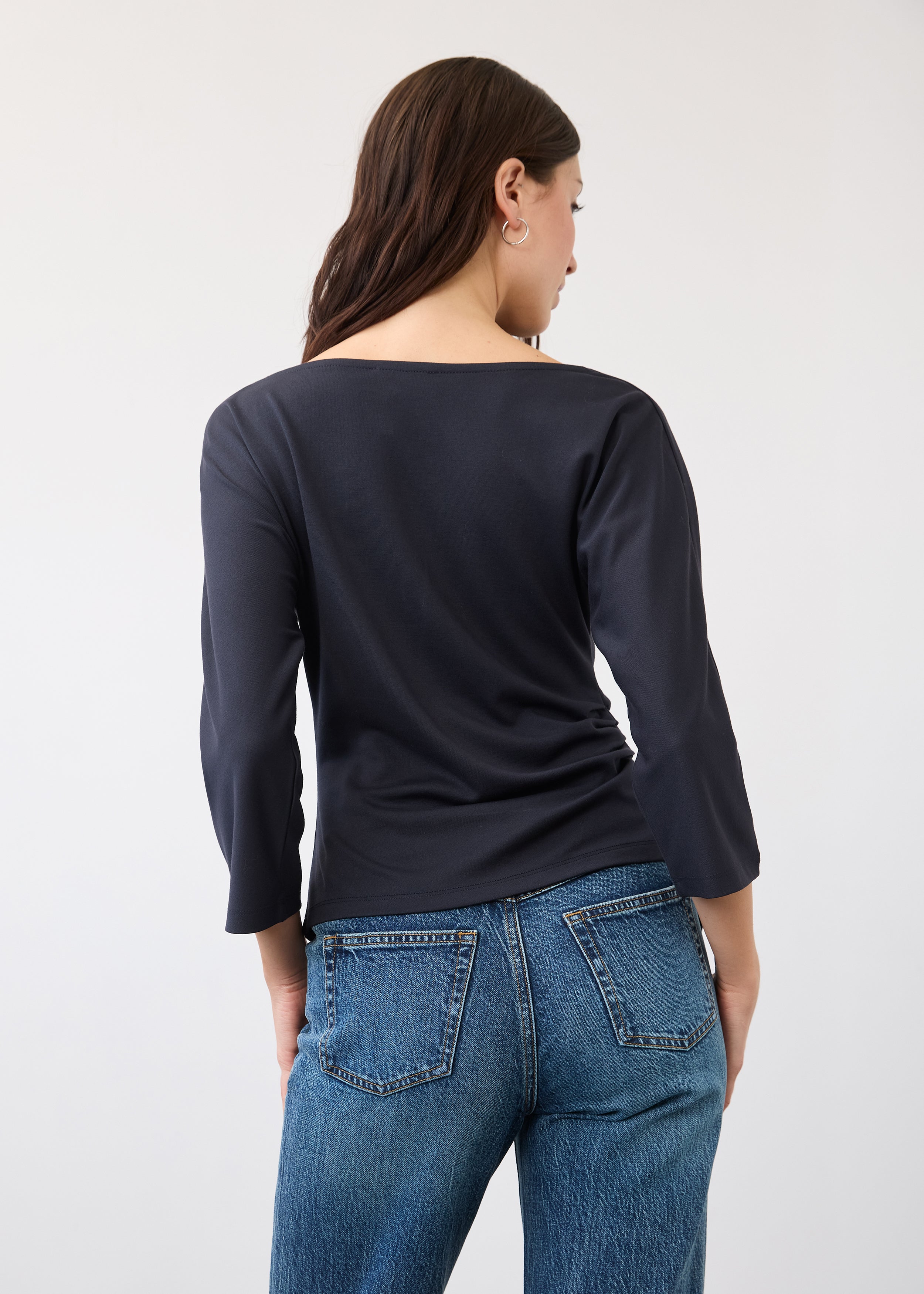 Back view of navy top showing seamless look and quarter sleeves by French Dressing Jeans (FDJ)