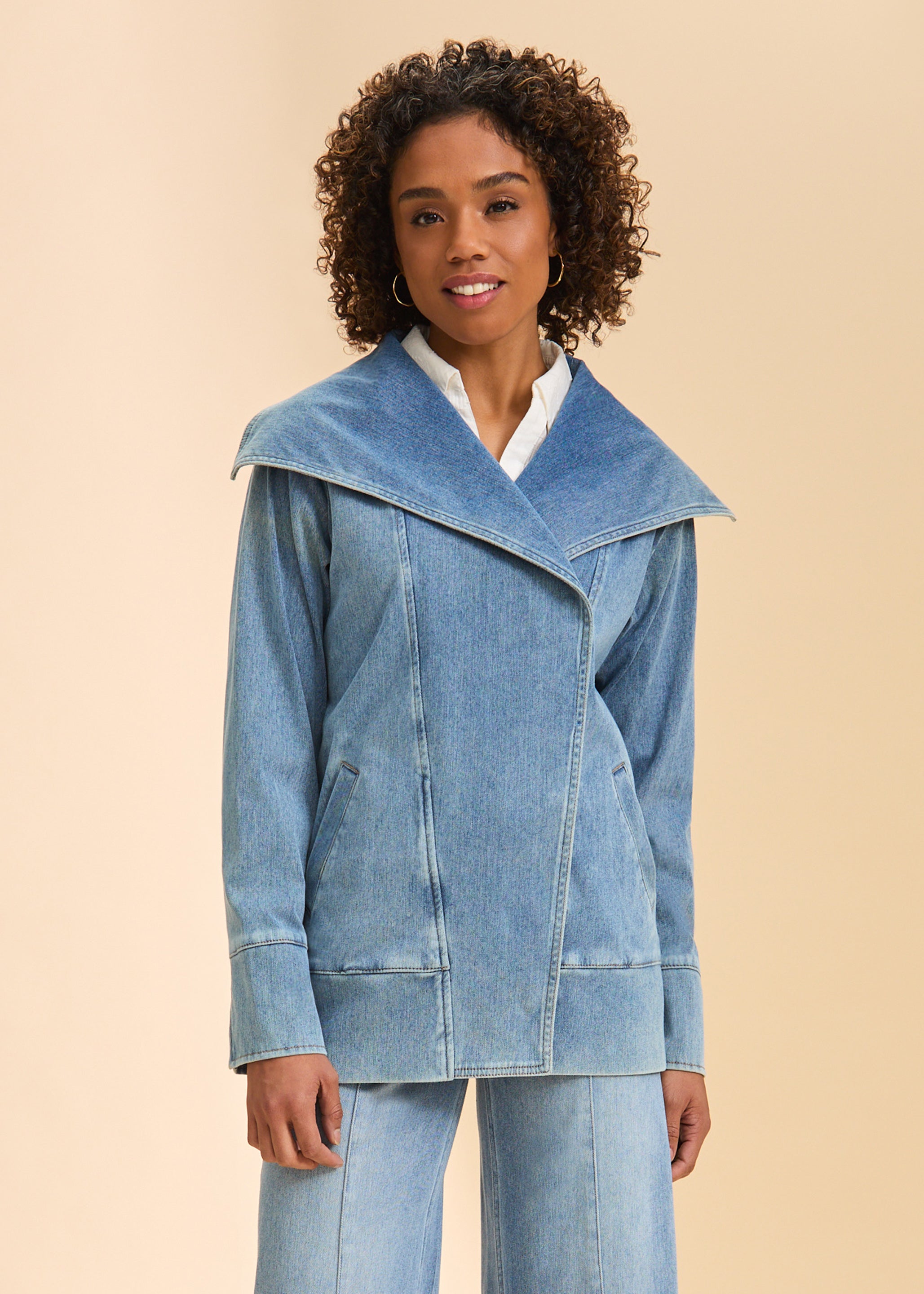 Front view of light blue denim jacket with wide collar and welt pockets by French Dressing Jeans (FDJ)