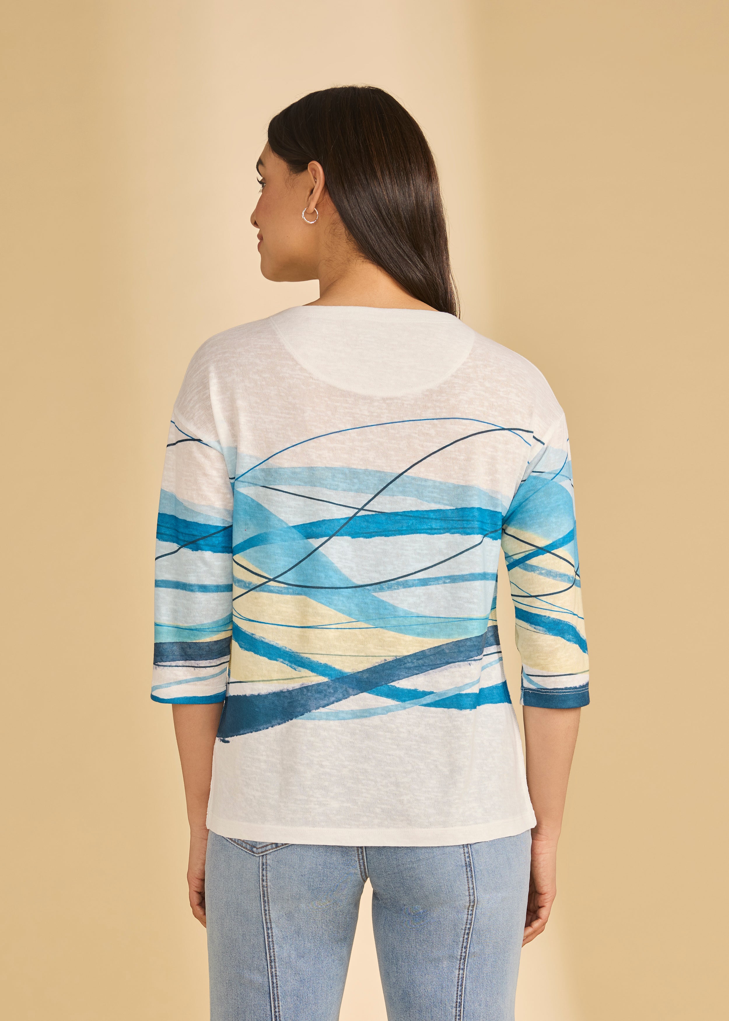 Back view of white top featuring blue wave design and casual fit by French Dressing Jeans (FDJ)