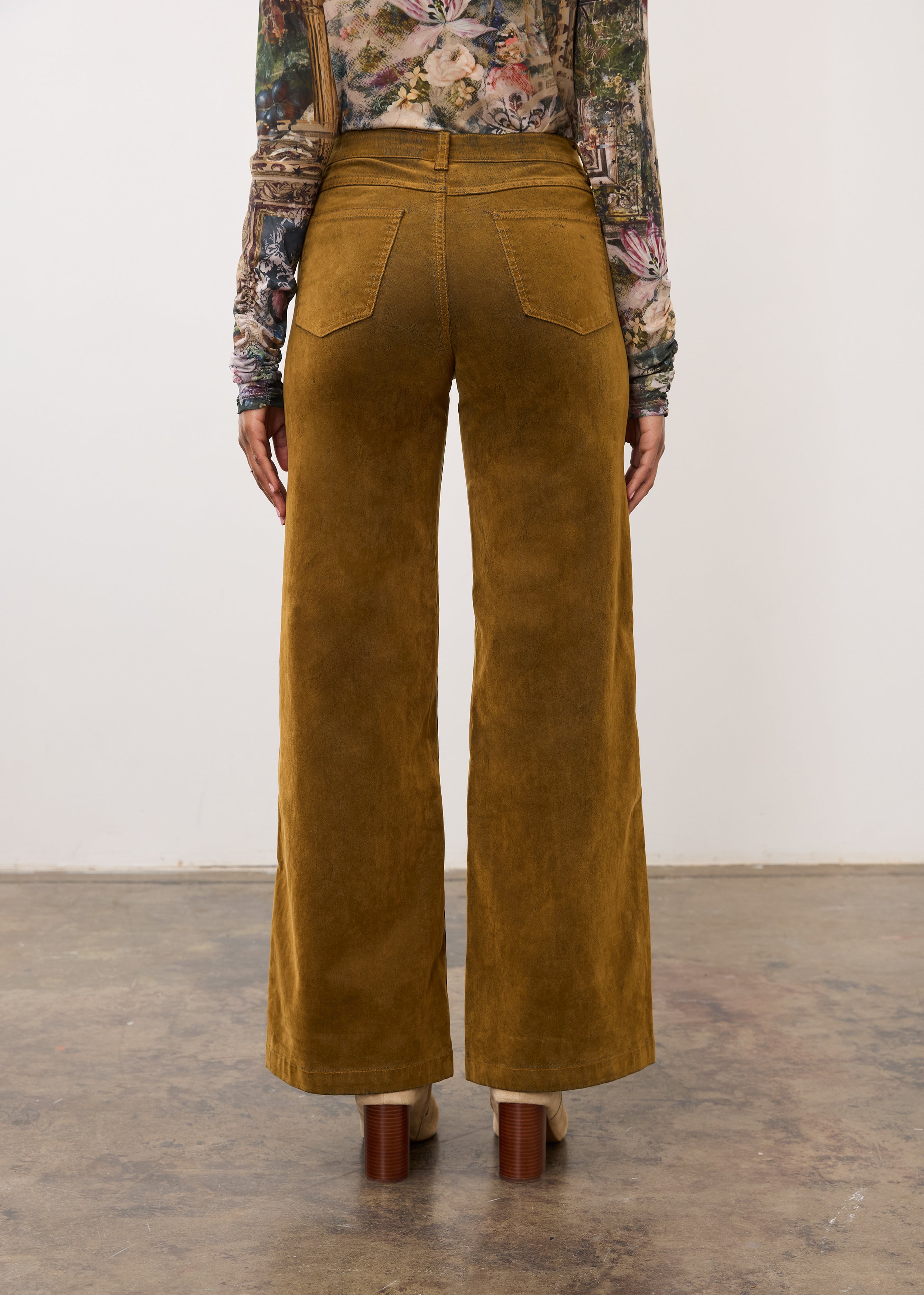 Back view of brass Olivia wide leg pants highlighting patch pockets by French Dressing Jeans (FDJ)