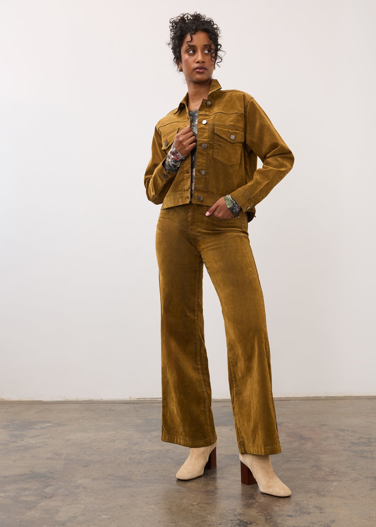 Full outfit view with brass Olivia wide leg denim and jacket in a fashion pose by French Dressing Jeans (FDJ)