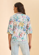 Back view of multicolored floral top highlighting soft fabric by French Dressing Jeans (FDJ)