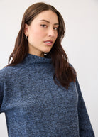 Close-up of textured indigo top highlighting fabric and neckline by French Dressing Jeans (FDJ)