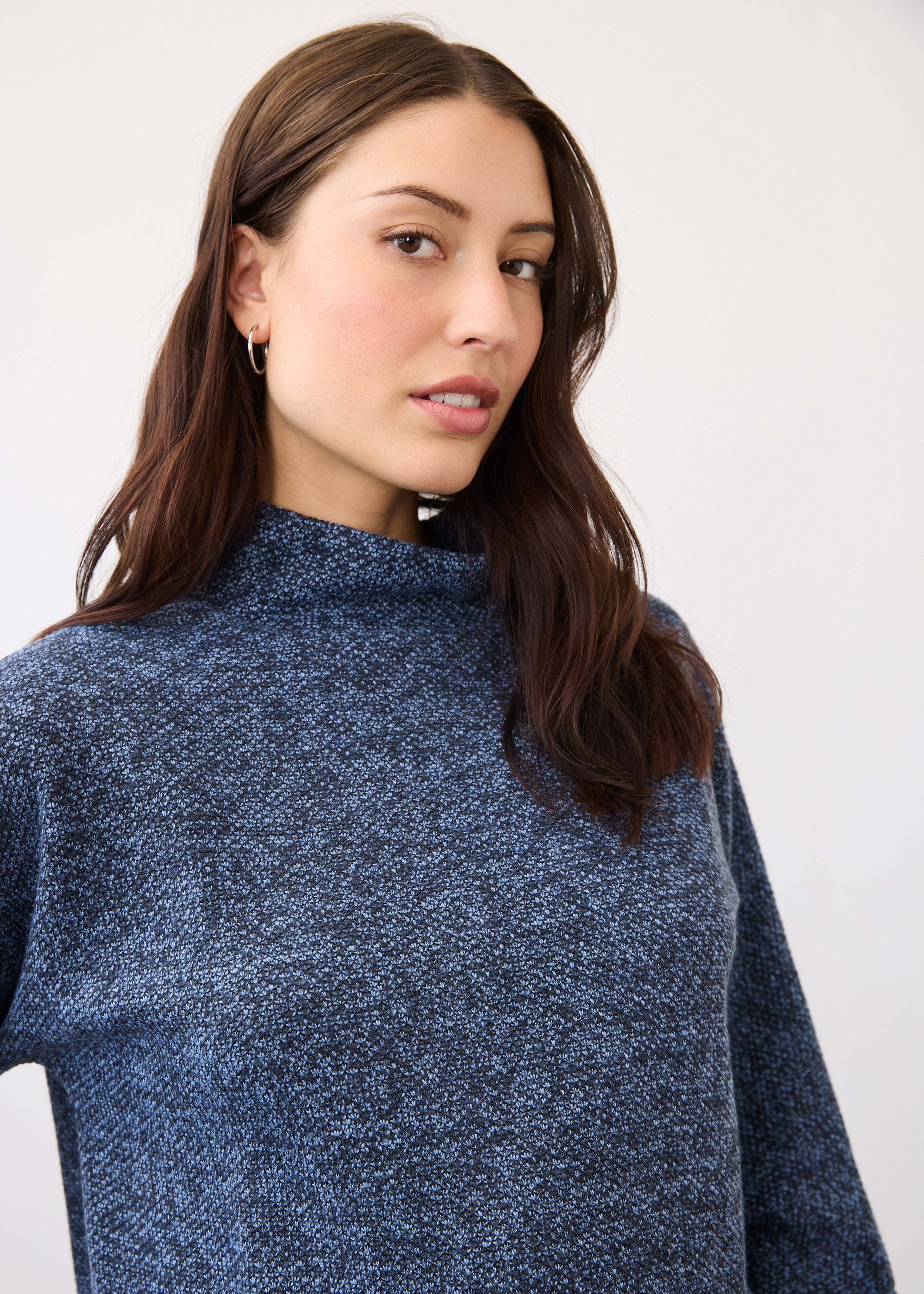 Close-up of textured indigo top highlighting fabric and neckline by French Dressing Jeans (FDJ)