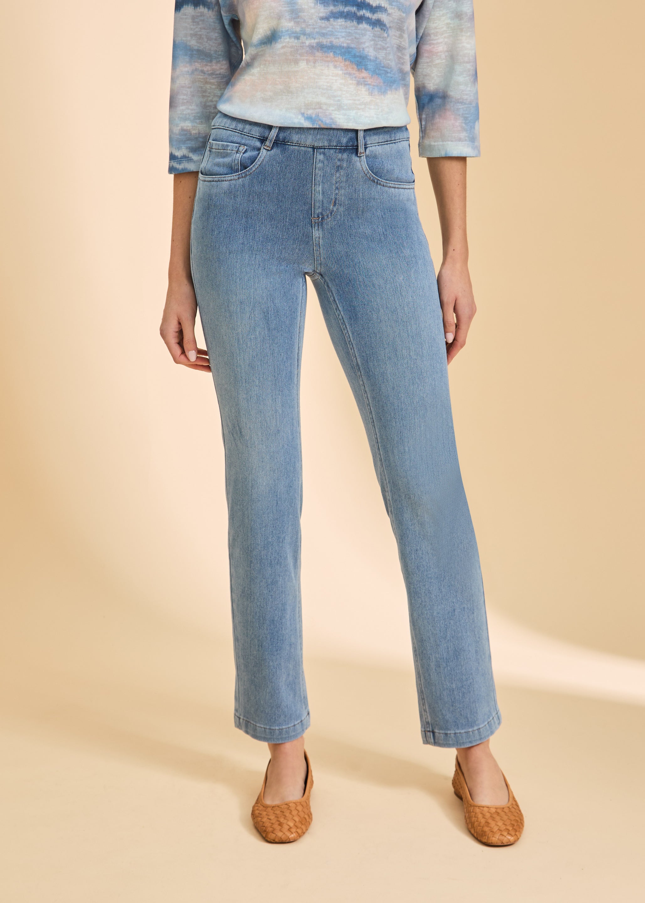 Close-up of light blue jeans showing front pocket and fit by French Dressing Jeans (FDJ)