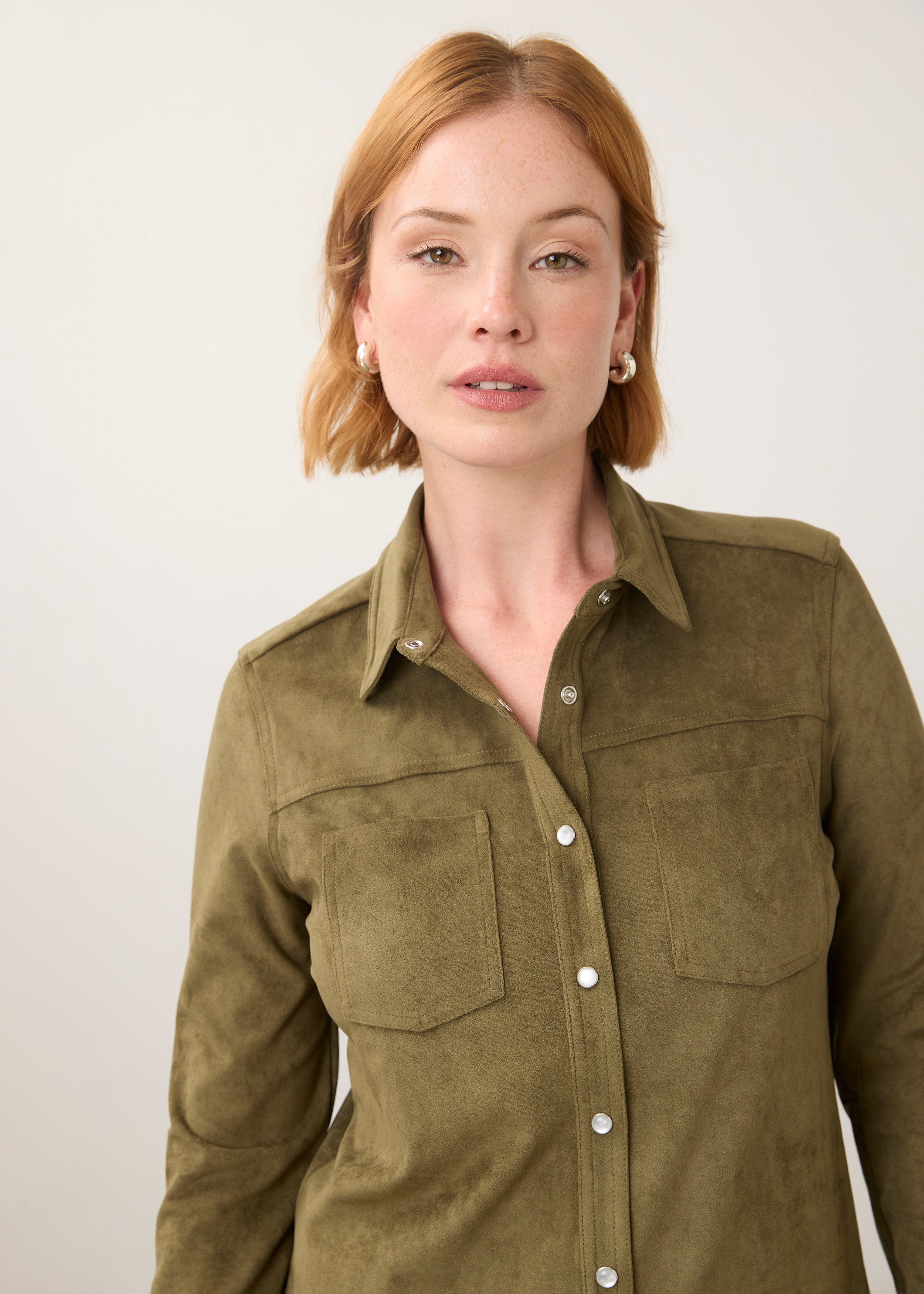 Close-up of olive suede shirt focusing on button details by French Dressing Jeans (FDJ)