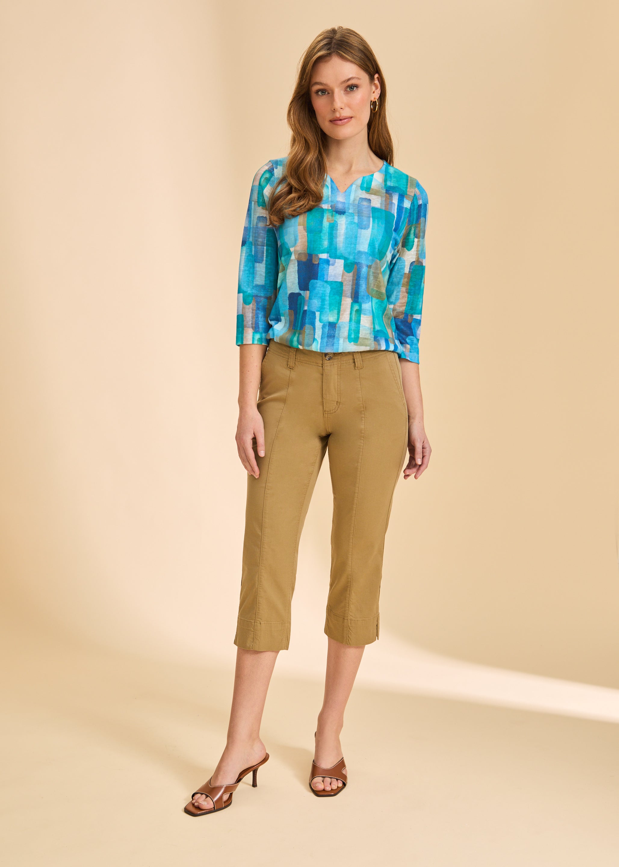 Full-body view of turquoise block print top with tan pants by French Dressing Jeans (FDJ)