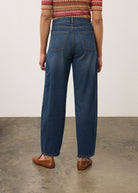 Back view of dark wash jeans with knit top, featuring back patch pockets by French Dressing Jeans (FDJ) par French Dressing Jeans (FDJ)
