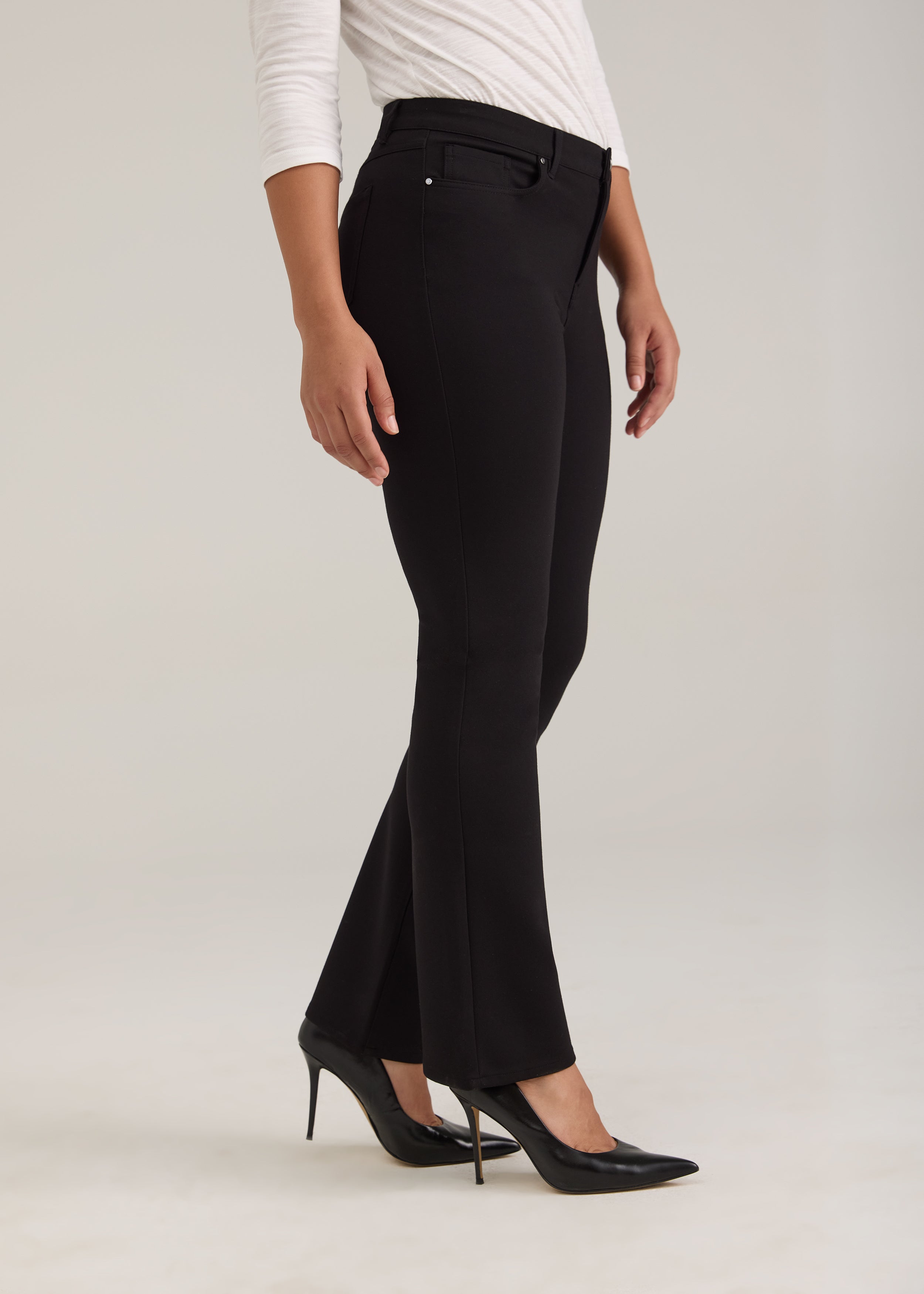 Side view of black pants showing ankle length and fit by French Dressing Jeans (FDJ)