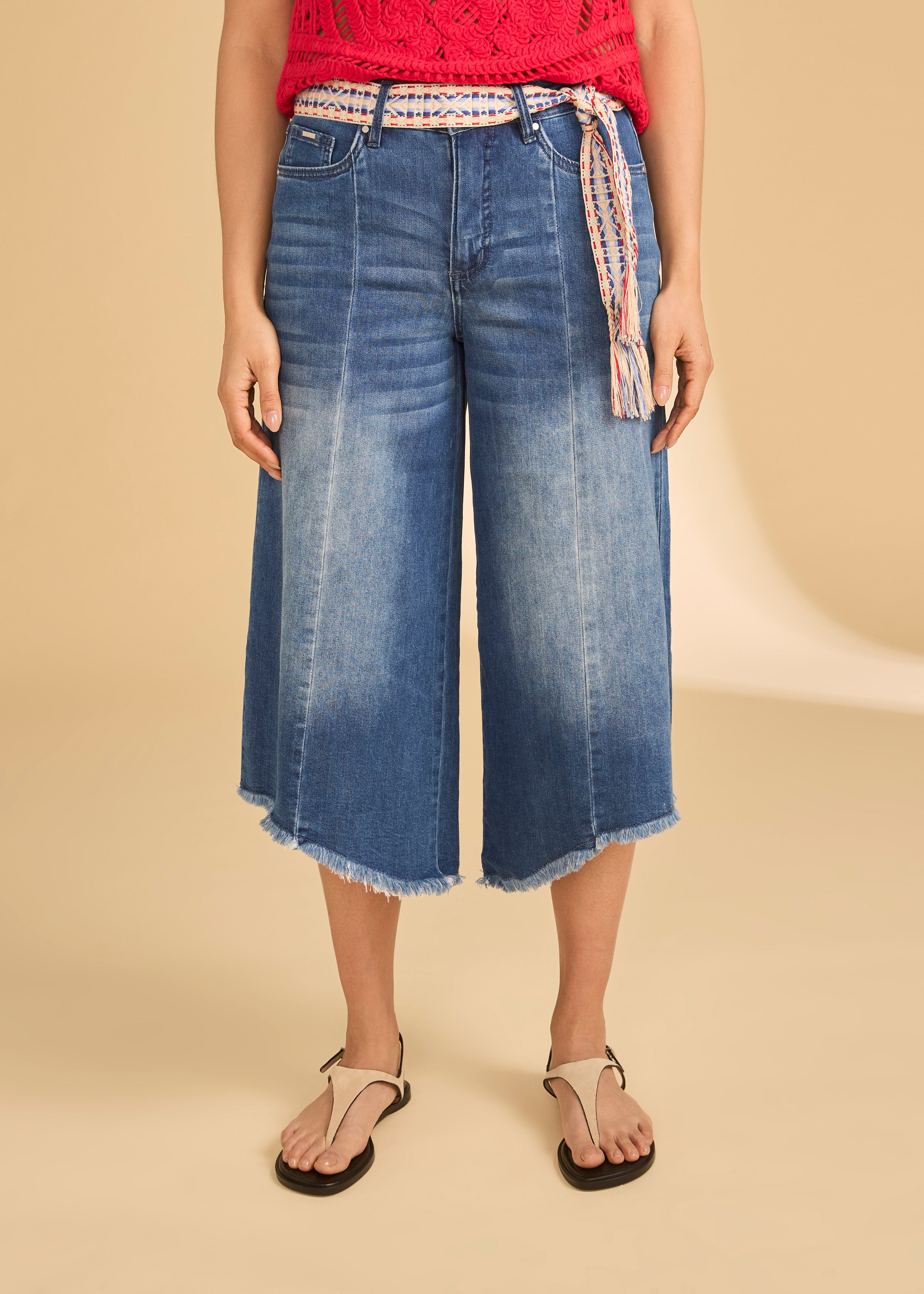 Front view of denim culottes with braided belt and crochet top by French Dressing Jeans (FDJ)