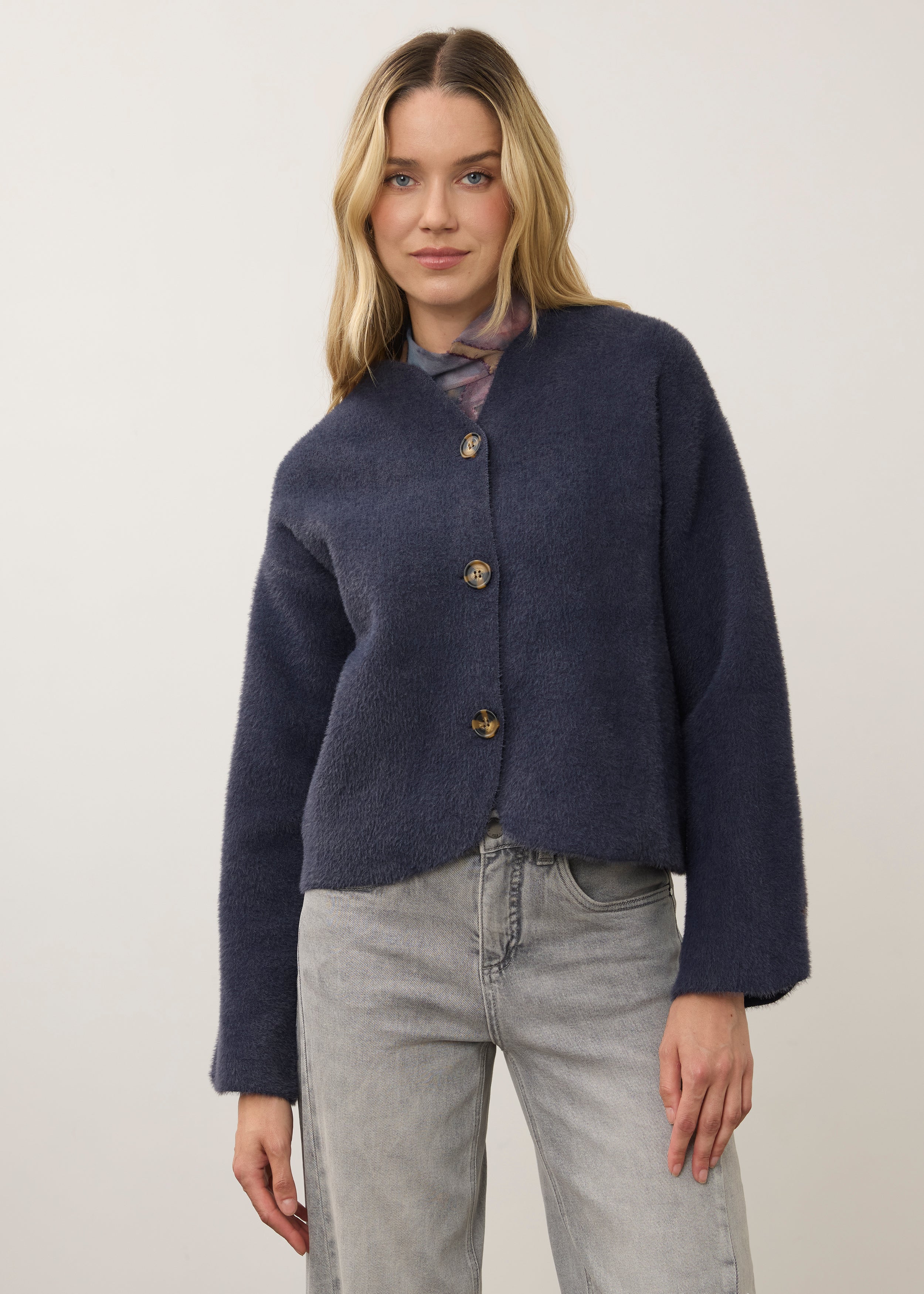 Front view of navy knit cardigan with button front and minimalist design by French Dressing Jeans (FDJ)