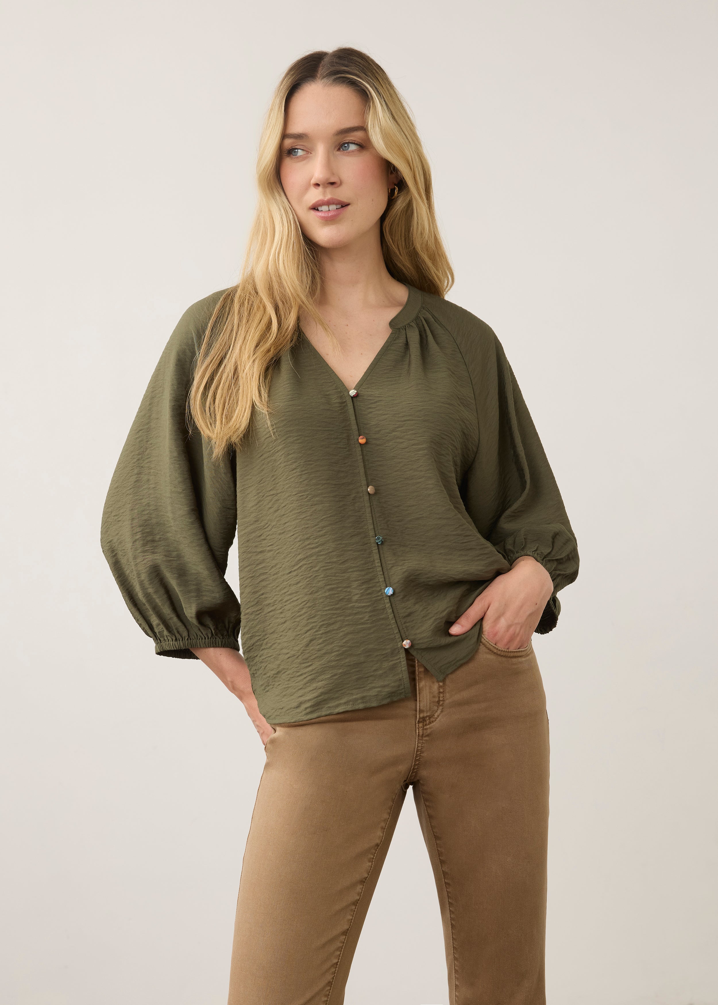 Front view of olive blouse with colorful buttons and V-neck by French Dressing Jeans (FDJ)