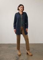 Full view of dark wash denim tunic over patterned top with tan pants by French Dressing Jeans (FDJ)