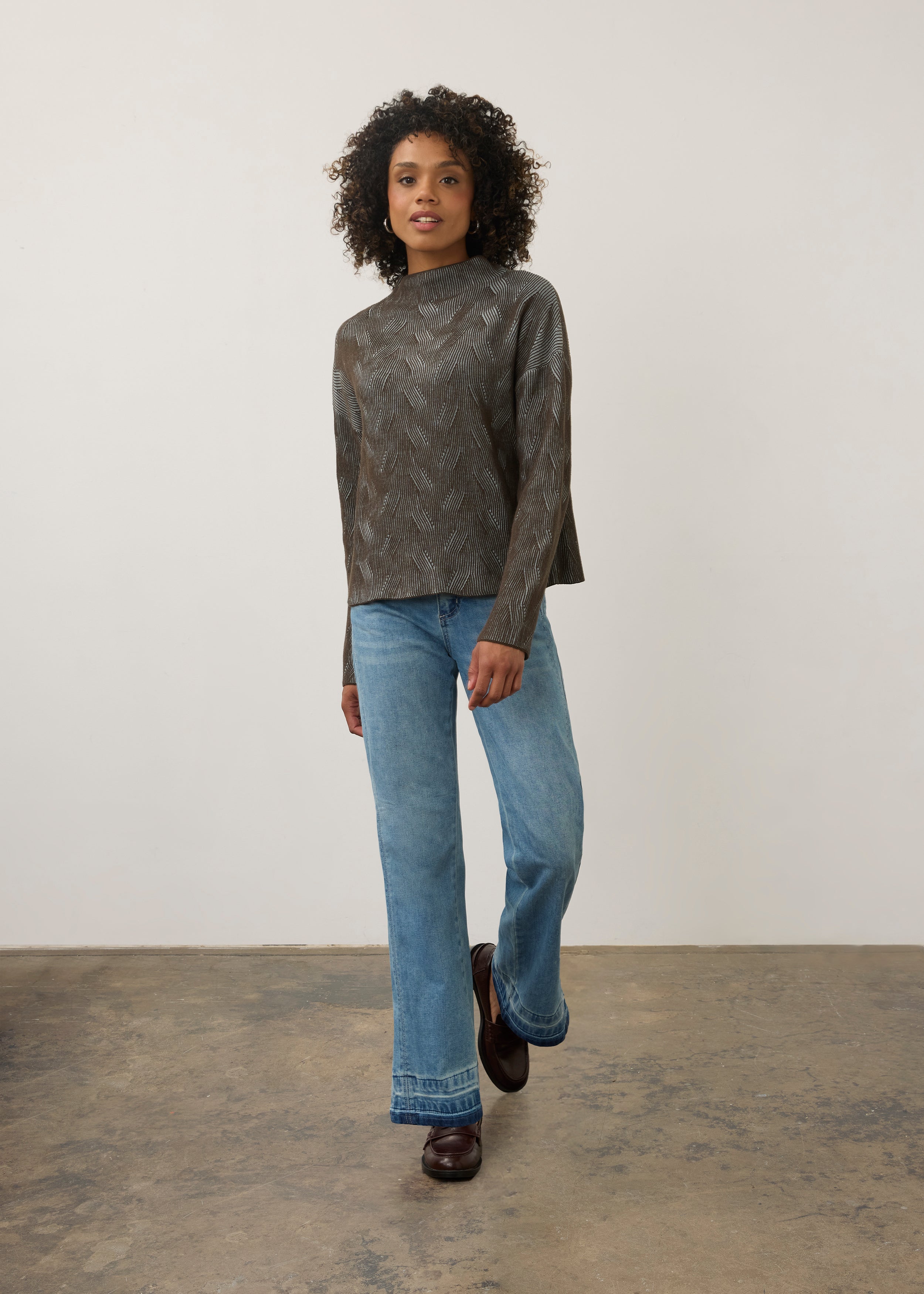 Model wearing brown textured top with jeans, full outfit view by French Dressing Jeans (FDJ)