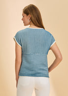 Back view of blue and white stripe sweater with detailed ribbing by French Dressing Jeans (FDJ)
