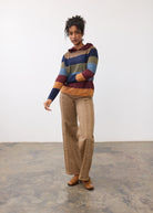 Full outfit view of striped hoodie sweater with brown pants by French Dressing Jeans (FDJ)