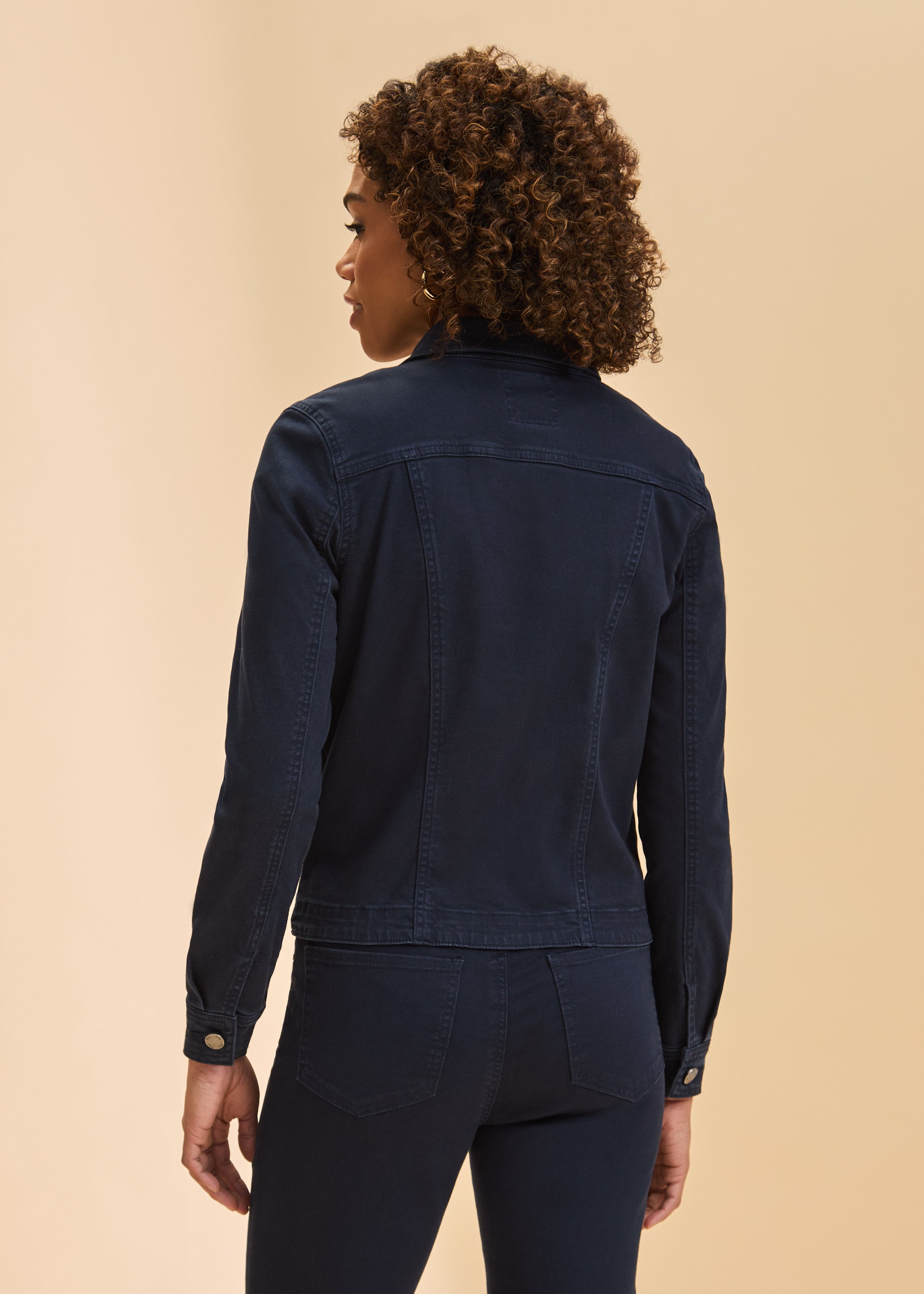 Back view of navy jacket showcasing tailored fit by French Dressing Jeans (FDJ)