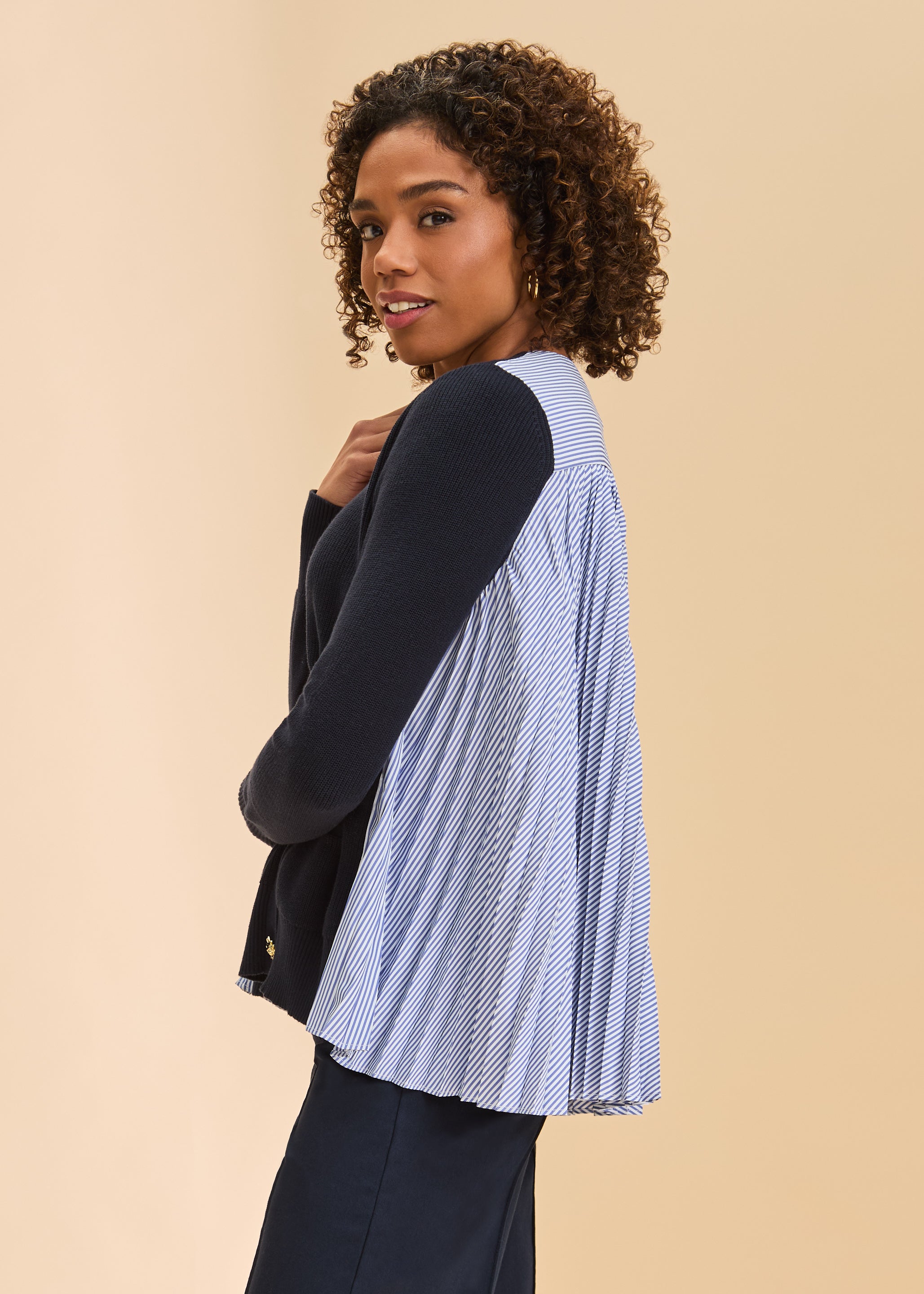Side view of navy cardigan with striped side panels and ribbed sleeves by French Dressing Jeans (FDJ)