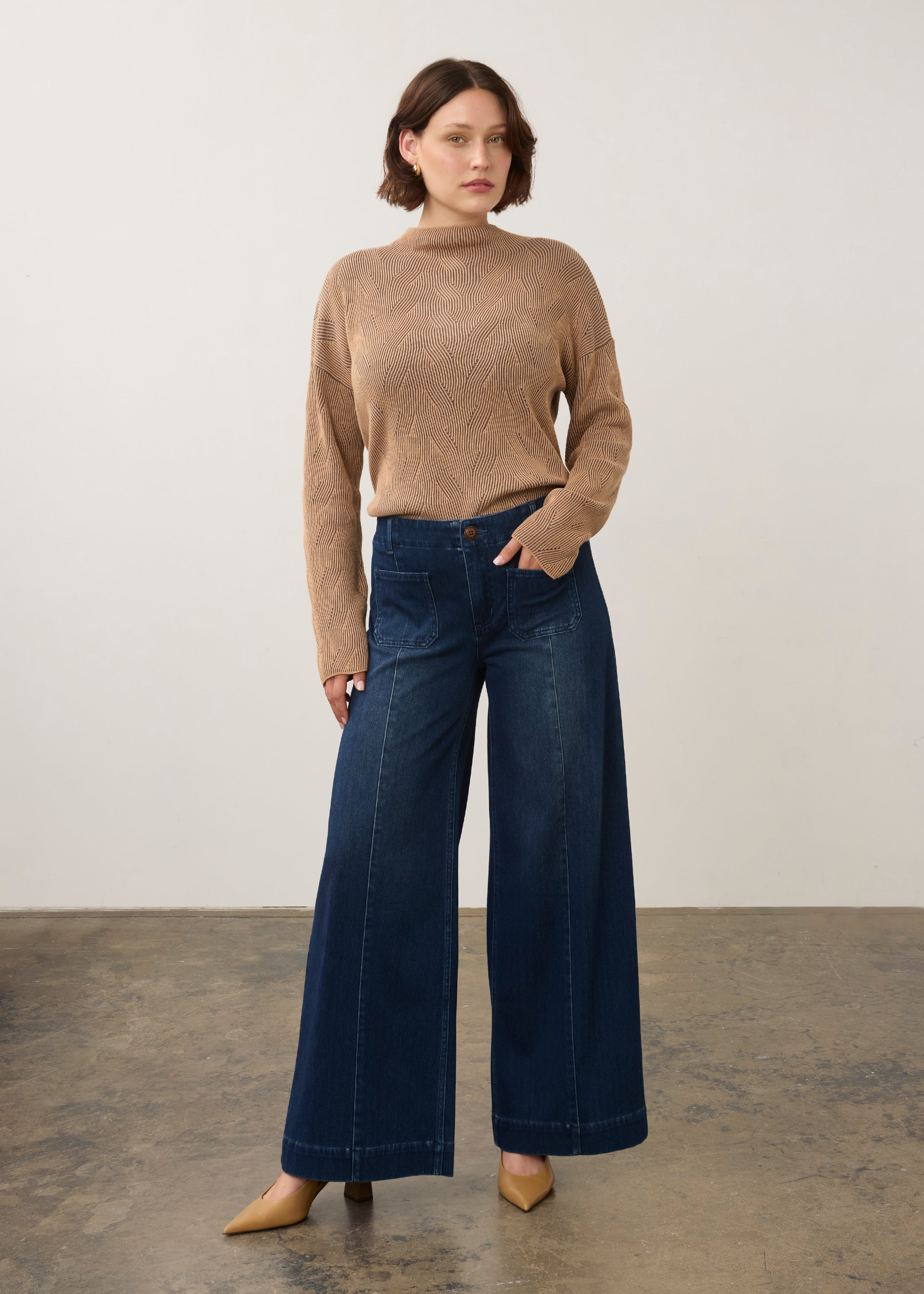 Dark rinse wide-leg jeans styled with knit sweater in full outfit view by French Dressing Jeans (FDJ)
