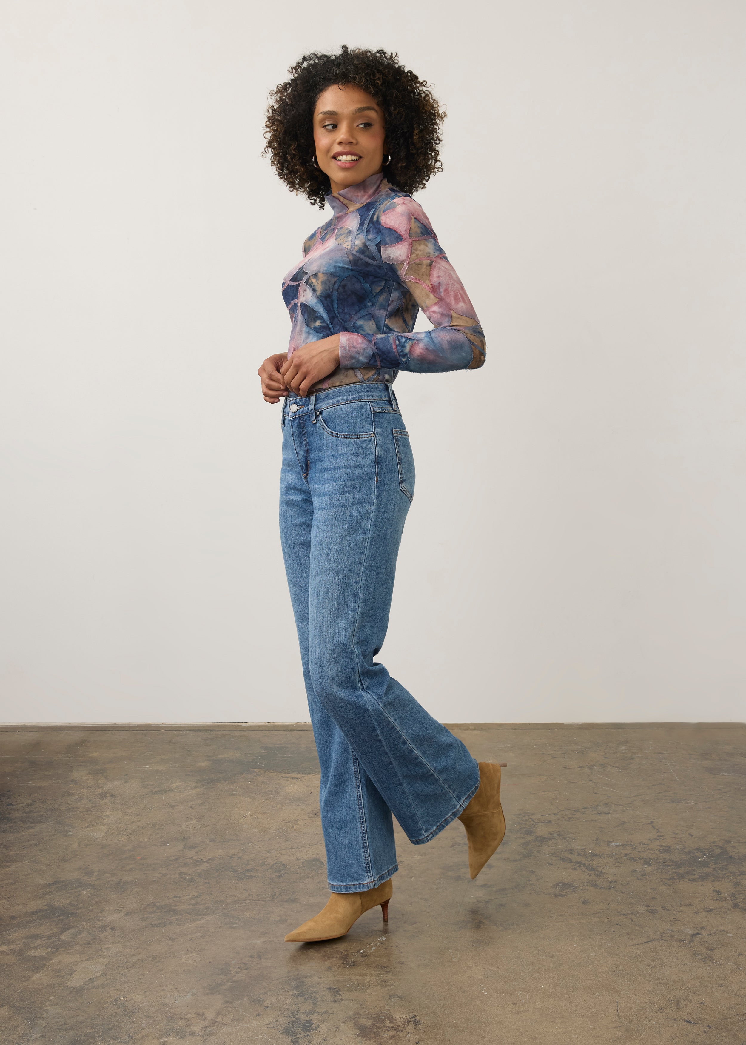 Full body view of medium wash denim pants showcasing high-rise waist and stylish fit by French Dressing Jeans (FDJ) par French Dressing Jeans (FDJ)