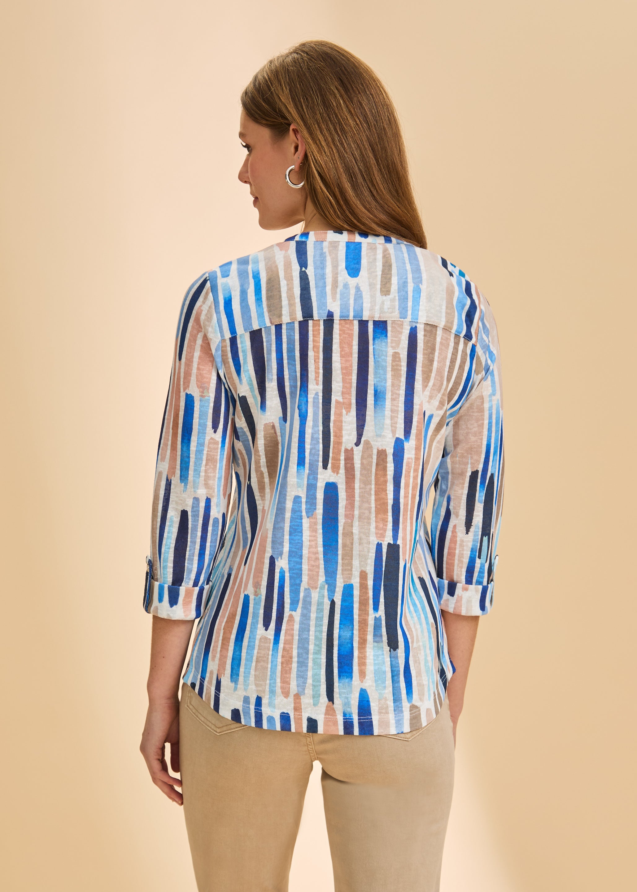 Back view of blue stripe Henley top showing 3/4 sleeves and relaxed fit by French Dressing Jeans (FDJ)