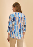 Back view of blue stripe Henley top showing 3/4 sleeves and relaxed fit by French Dressing Jeans (FDJ)