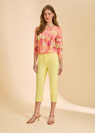 Full-length view of orange block print top with yellow pants by French Dressing Jeans (FDJ)