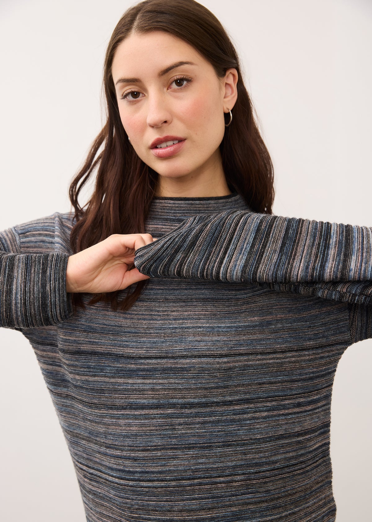 Close-up of multicolored striped sweater focusing on texture by French Dressing Jeans (FDJ)
