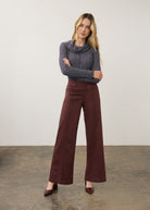 Full view of burgundy wide-leg denim paired with grey sweater by French Dressing Jeans (FDJ) par French Dressing Jeans (FDJ)