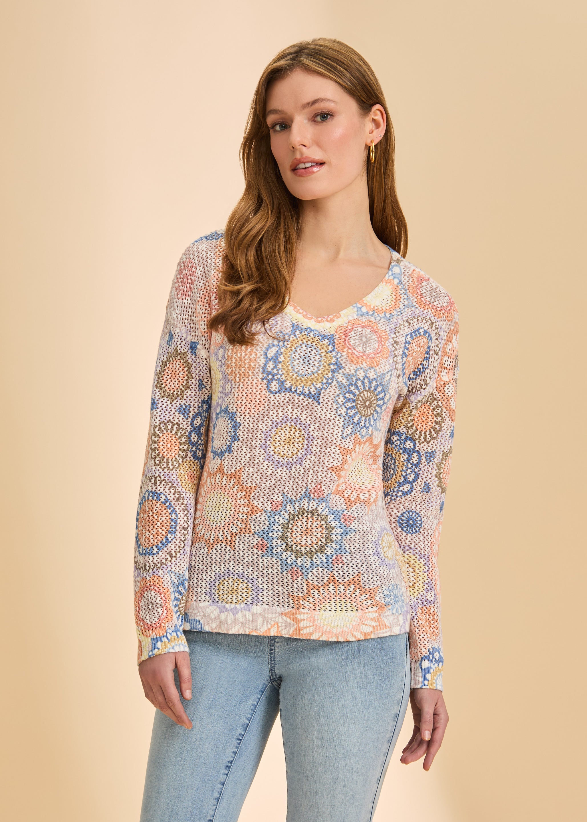 Front view of orange and blue patterned mesh sweater with v-neck by French Dressing Jeans (FDJ)