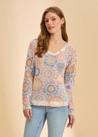 Front view of orange and blue patterned mesh sweater with v-neck by French Dressing Jeans (FDJ)